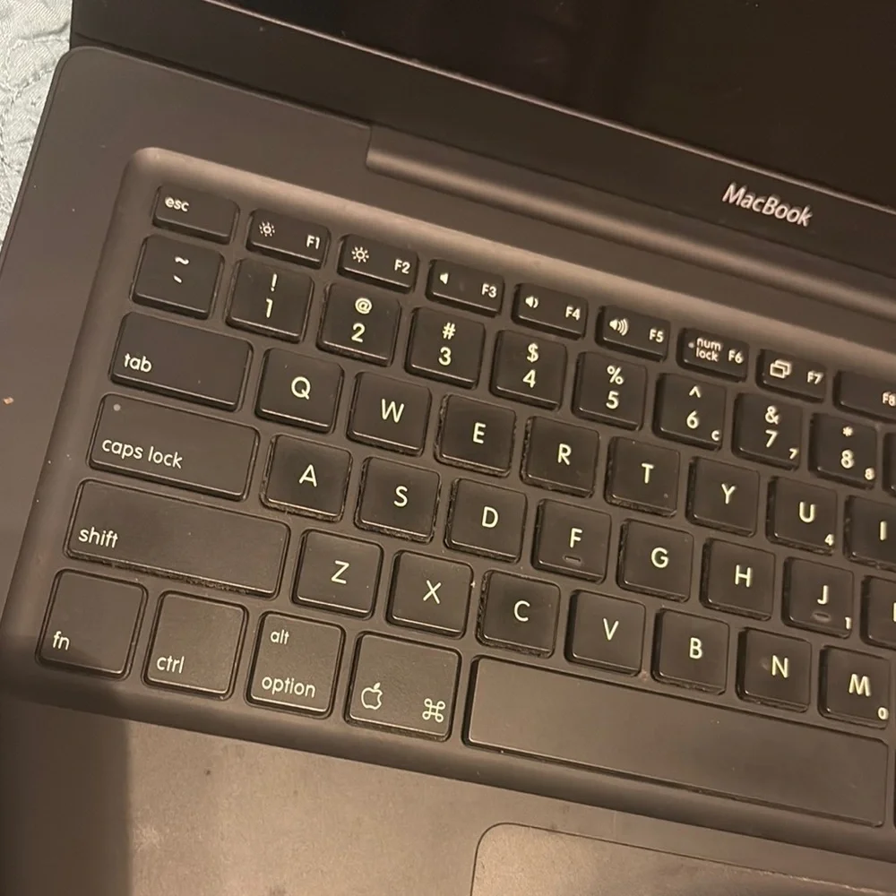 Apple Black Laptop with Sleek Design and Premium Finish